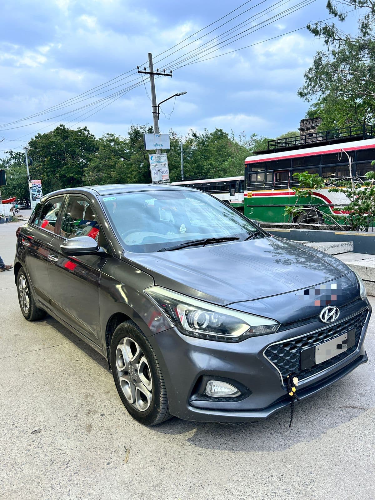 A photo of a Hyundai i20 Diesel - Gray hatchback.