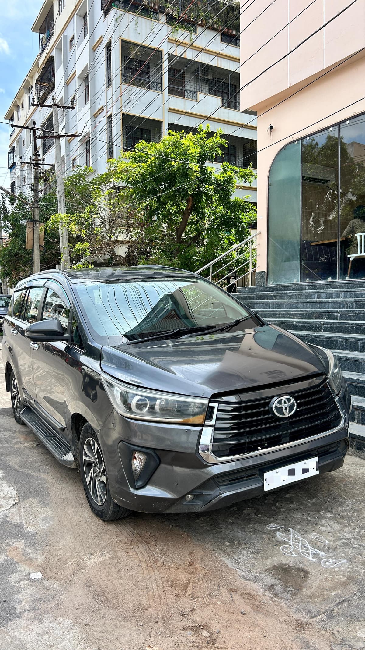 A photo of a Toyota Innova Crysta 2022 - White MUV.