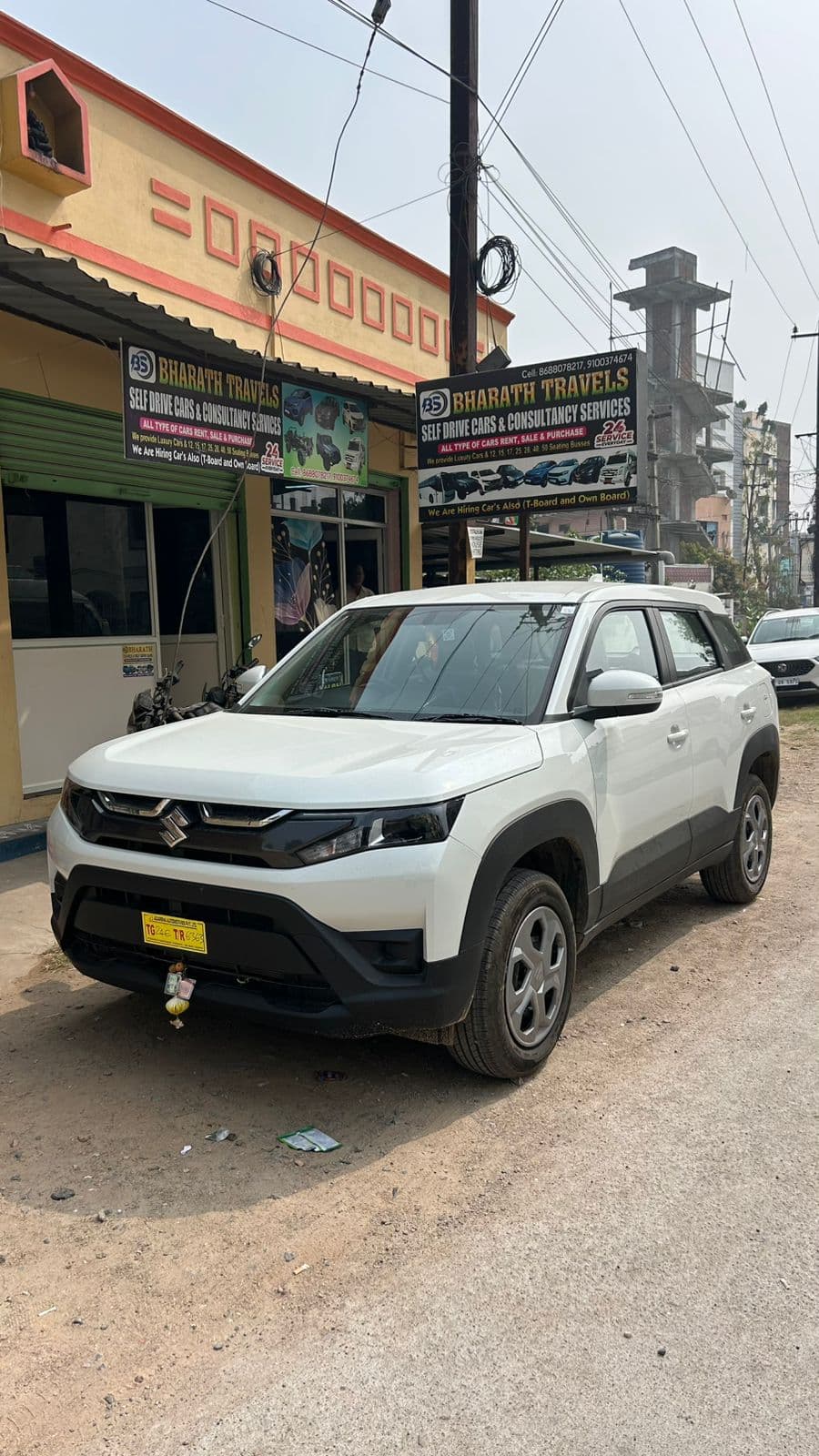 A photo of a Maruti Brezza 2026 ZXI - White SUV.