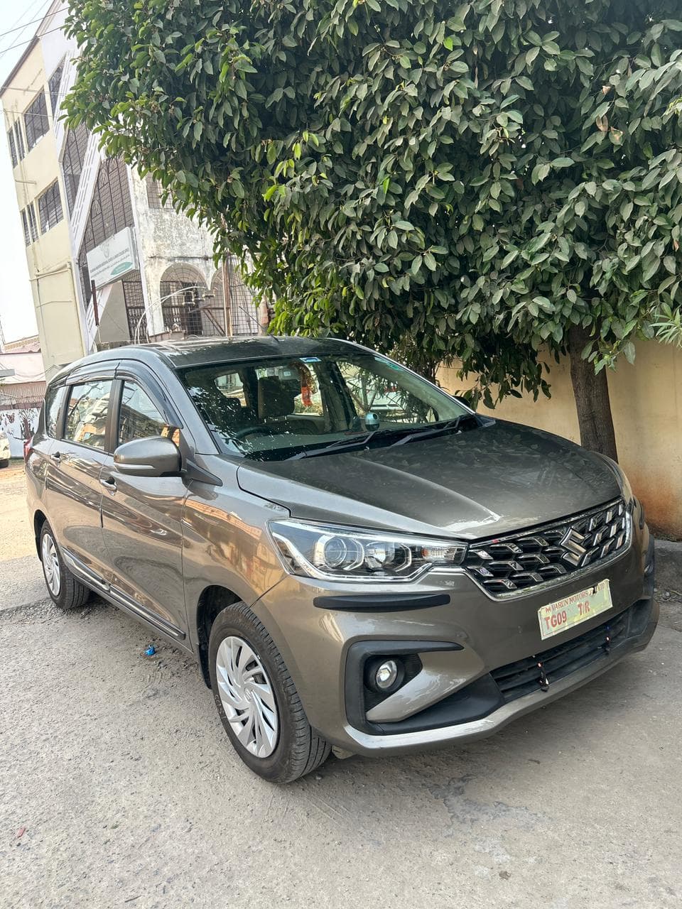 A photo of a Maruti Ertiga CNG VXI 2026 - Gray MUV.