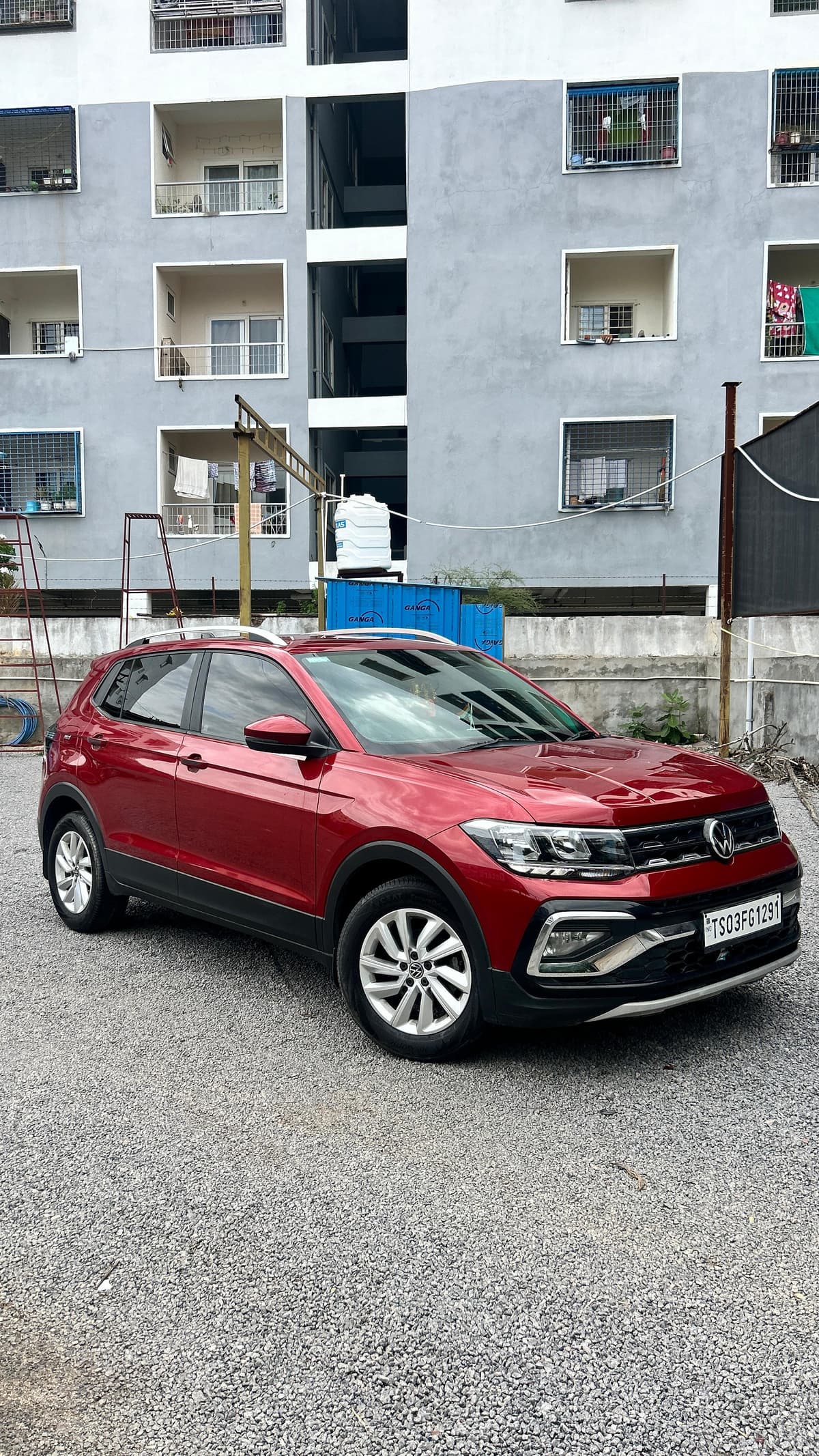 A photo of a Volkswagen Taigun 2024 - Red SUV.