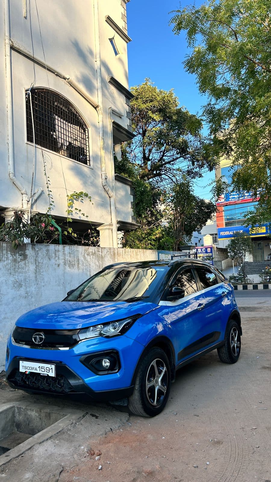 A photo of a Tata Nexon 2022 - Blue SUV.