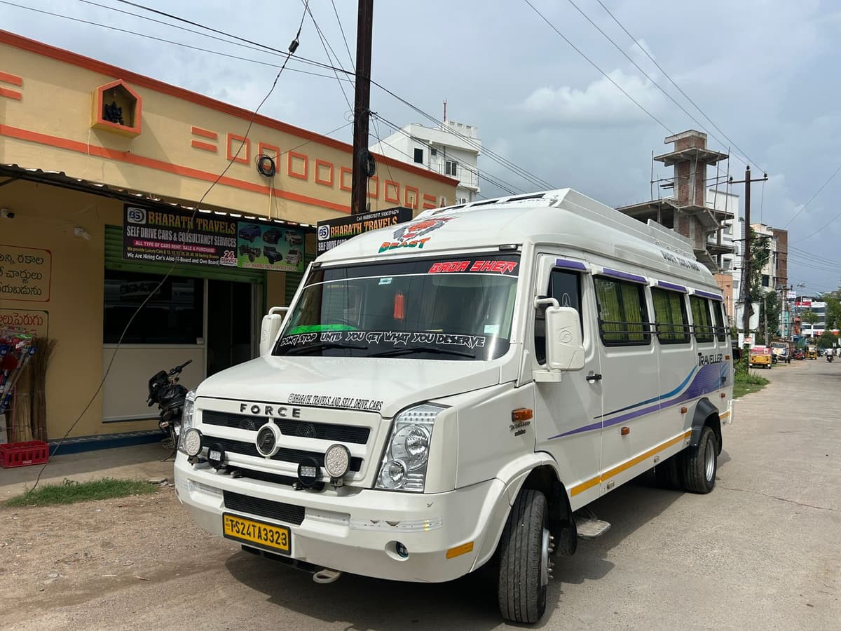 A photo of a Force Tempo Traveller 17/20 Seater - White AC/Non-AC.