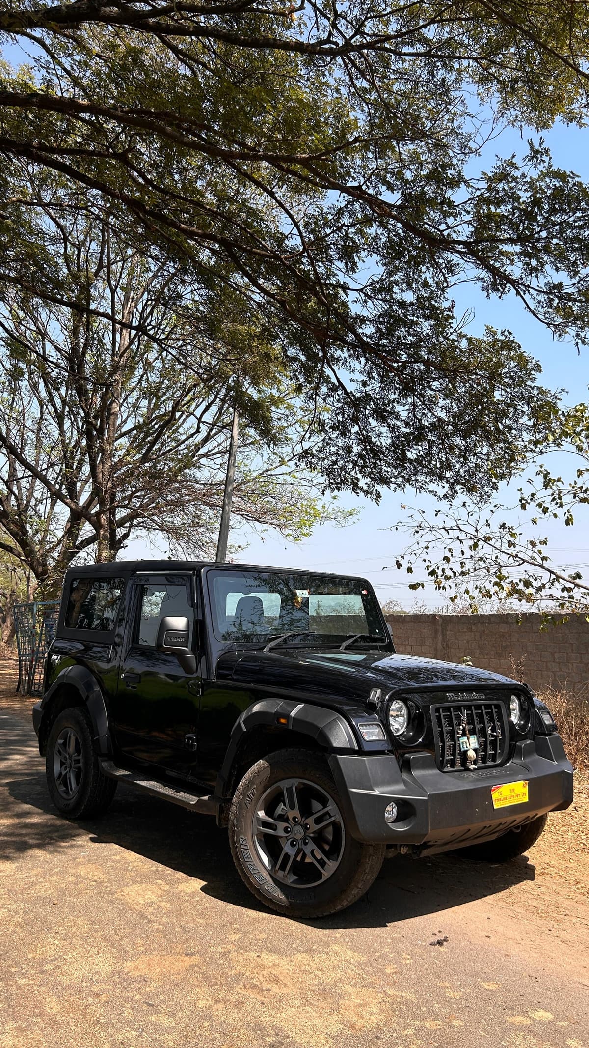 A photo of a Mahindra Thar 2025 - Black off-roader.